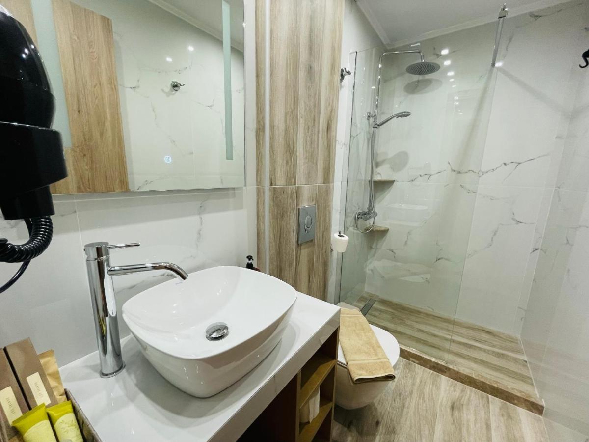 Xenios Suites Ligourio Bagian luar foto